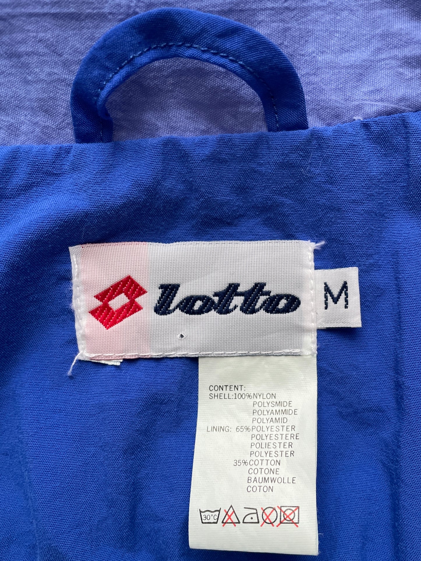 Veste de sport Lotto bleu et vert 38