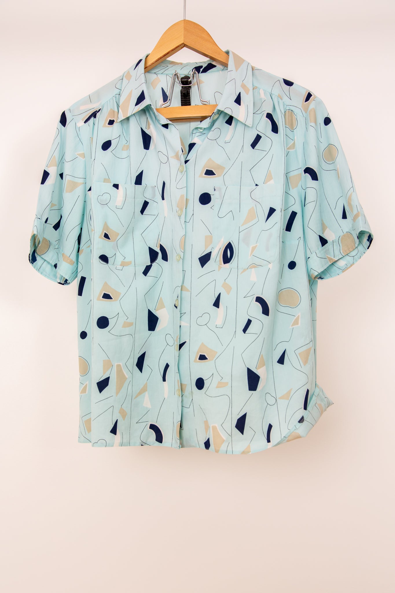 Chemisier à motifs bleus et beiges 38