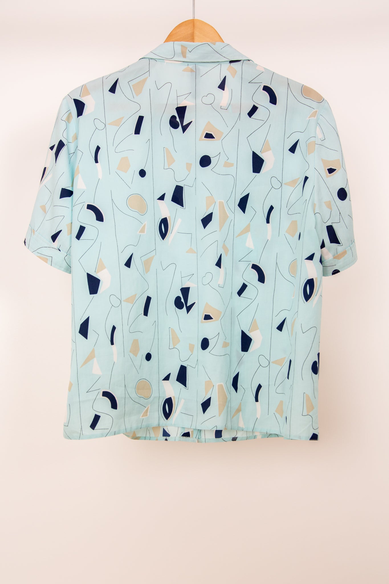 Chemisier à motifs bleus et beiges 38