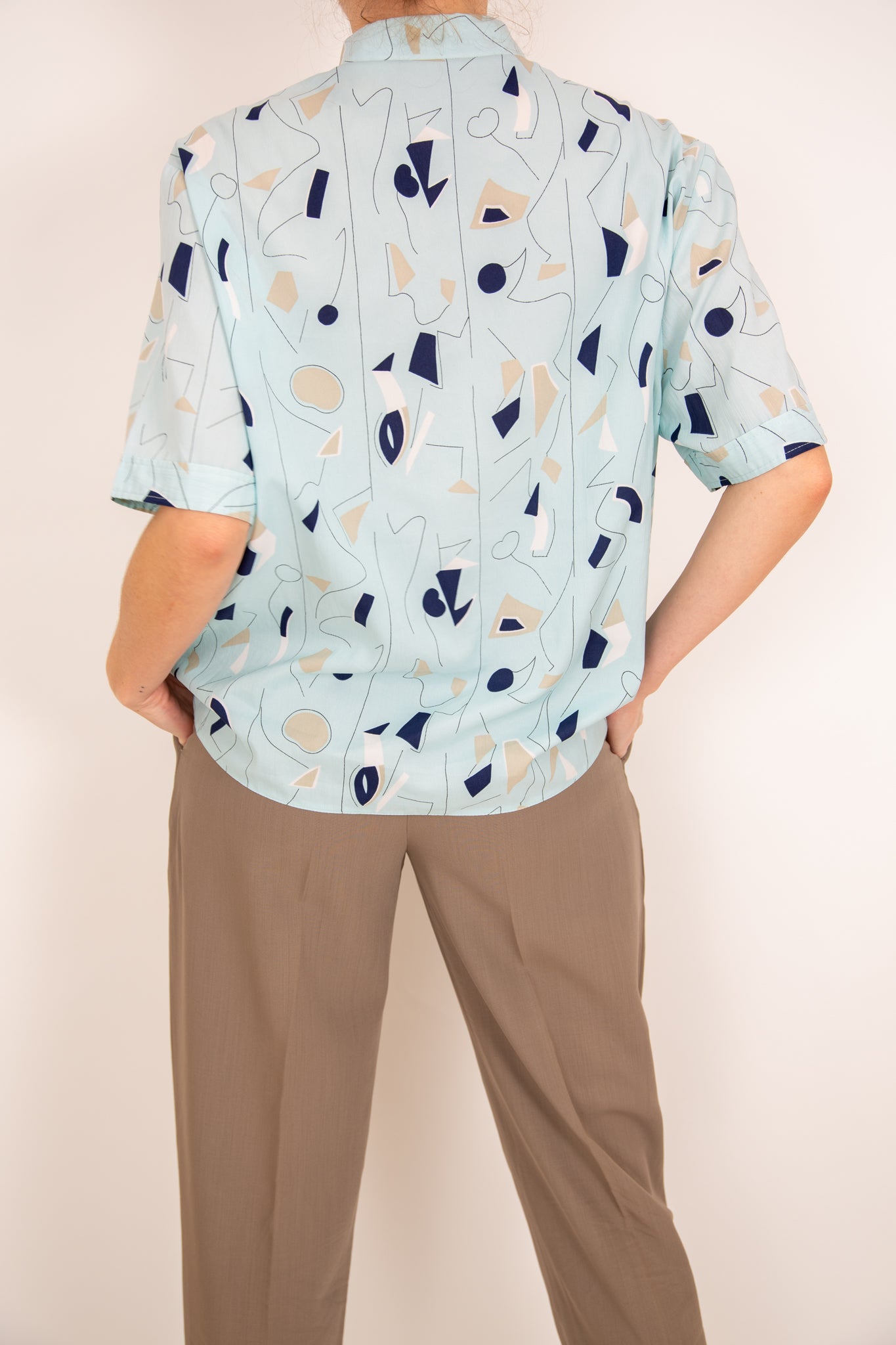Chemisier à motifs bleus et beiges 38