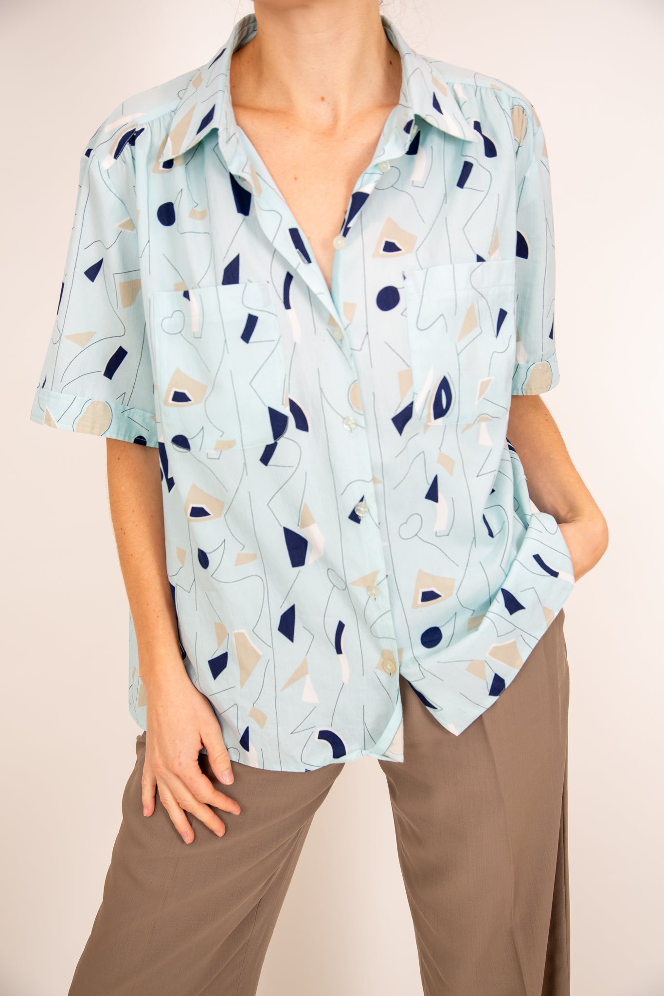 Chemisier à motifs bleus et beiges 38