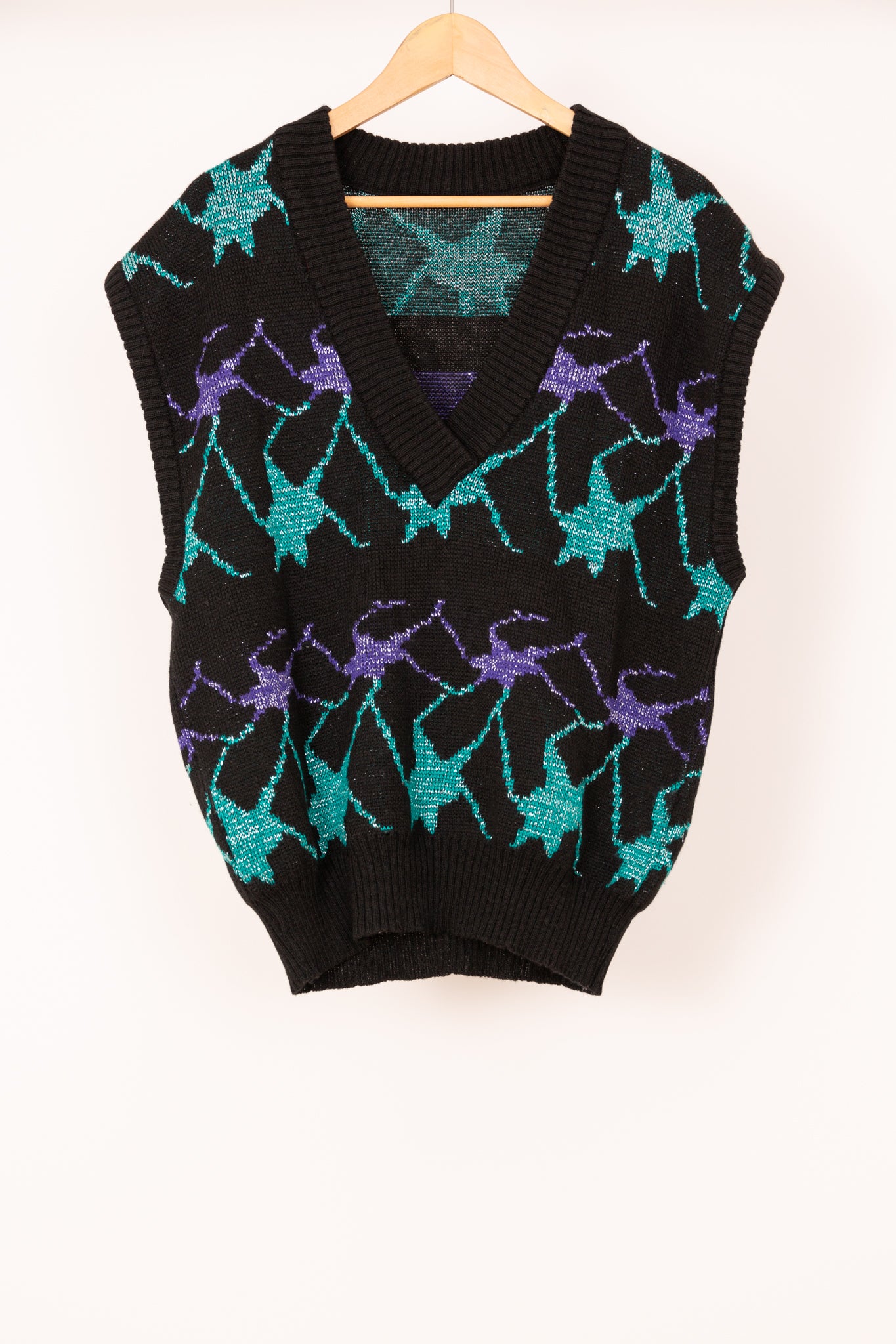 Pull sans manches noir, bleu et violet métallisés 42