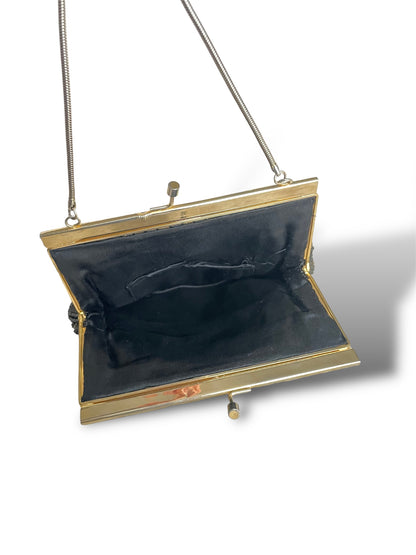 Minaudière à perles noires et dorées