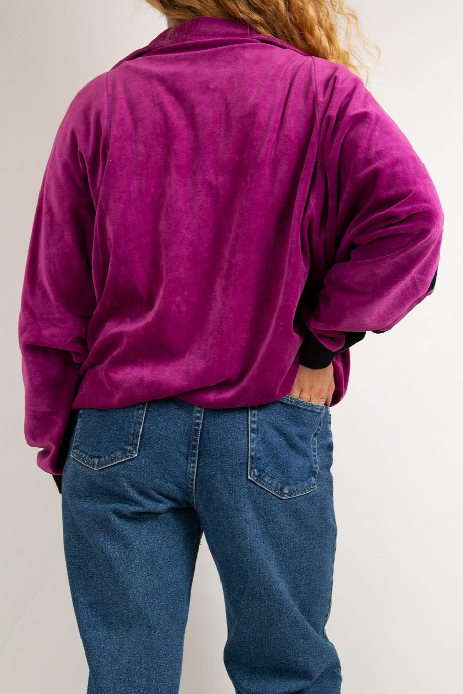 Veste de sport peau de pêche noir et violet 46