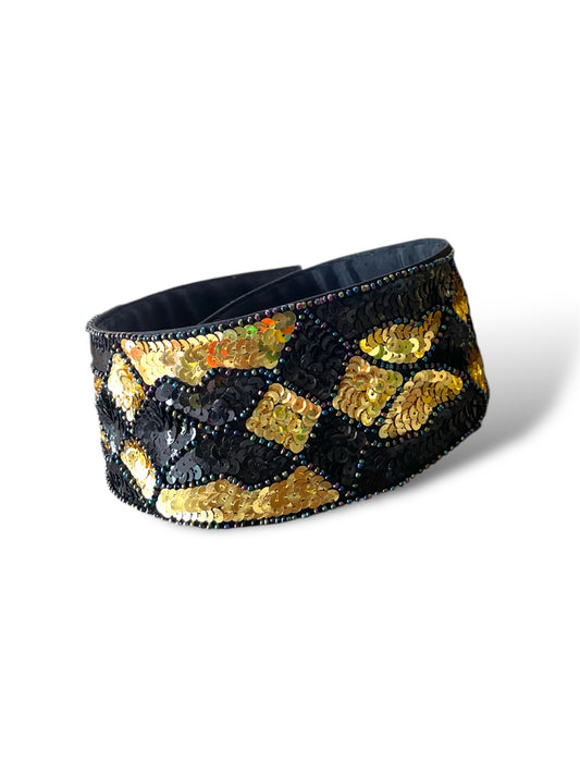 Ceinture à sequins noirs et dorés